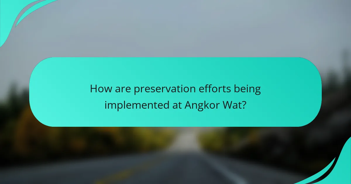 How are preservation efforts being implemented at Angkor Wat?