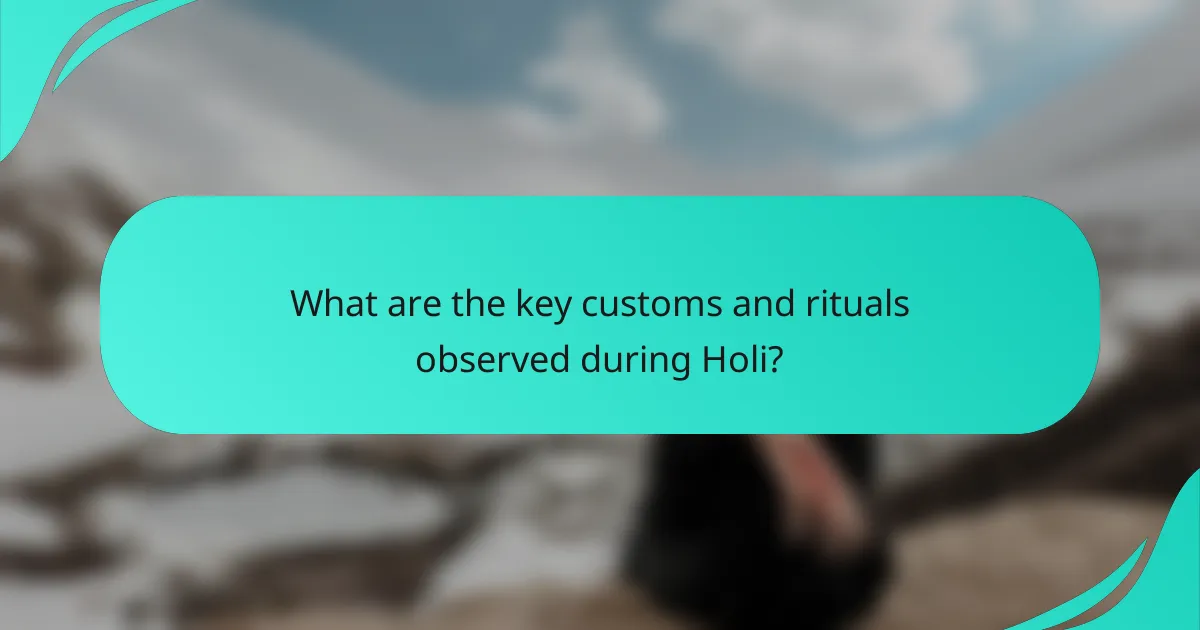 What are the key customs and rituals observed during Holi?